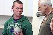Students interact with faculty.