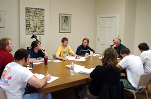 Prof. Placher with students during a religion class.