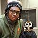 Marlon Lewis '20 and his hand-carved puppet