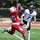Byshup Rhodes '19 goes for the tackle.