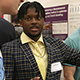 JoJo Carter '25 demonstrates his research on the LOCKR gene editing method.