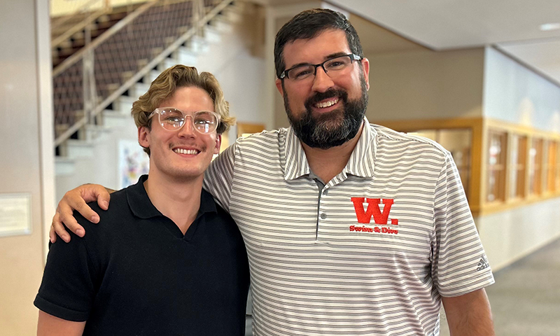 Senior member of the Little Giants Swimming and Diving team Connor Craig ’25 and Head Coach Will Bernhardt.