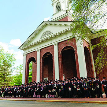 New graduates on the steps of the Chapel