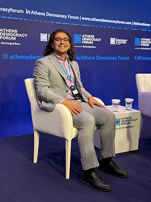 Andrew Dever ’25 at the Athens Democracy Forum