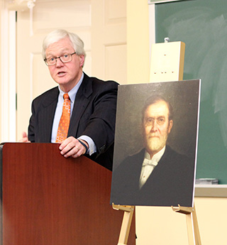 Judge John Daniel Tinder along with a portrait of Judge William Woods.