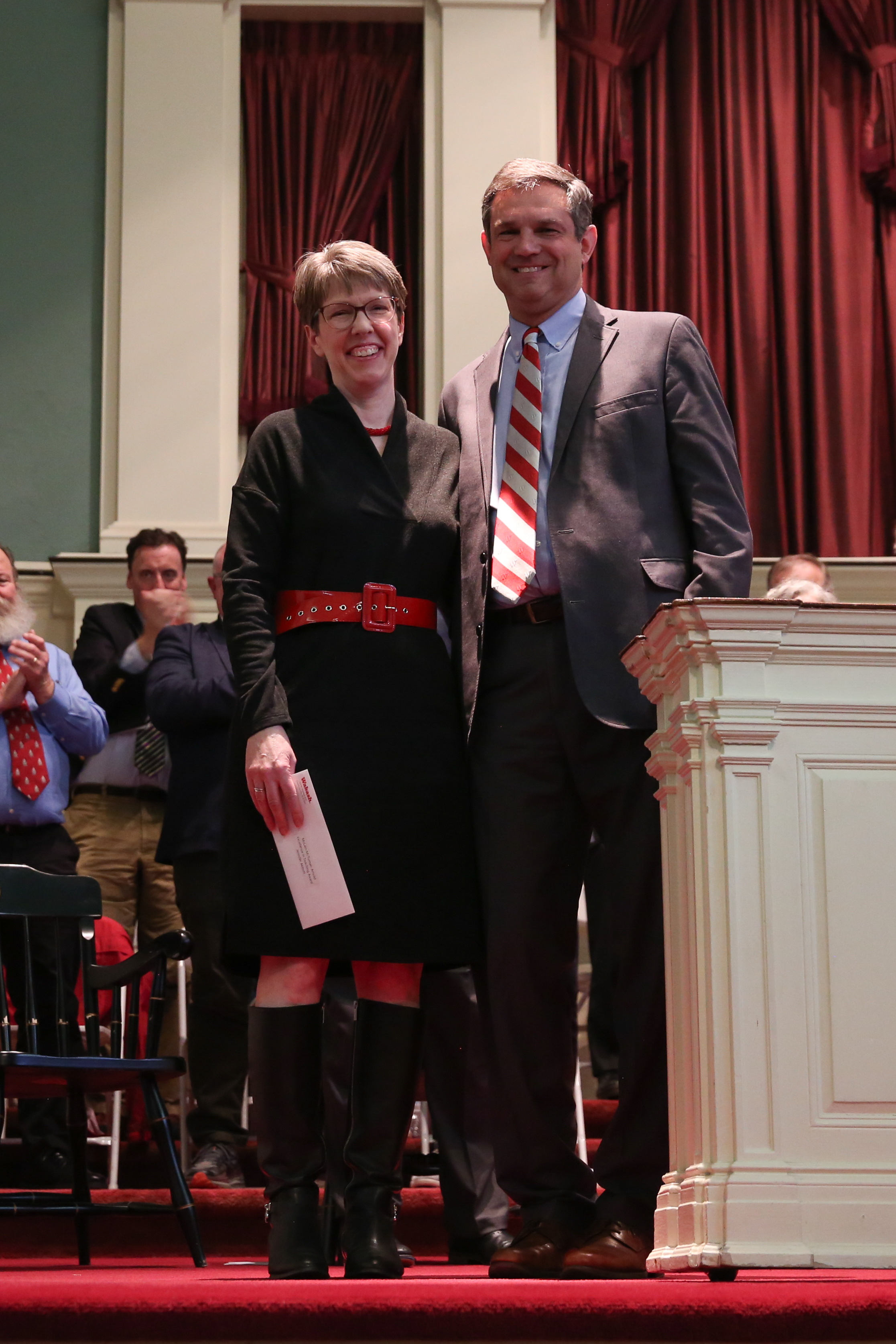Professor Abbott receives the McClain-McTurnan-Arnold Award from long-time rhetoric colleague, Dean of the College Todd McDorman, at the 2024 Awards Chapel
