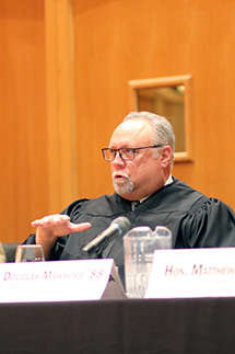 Delaware County Circuit Judge Douglas Mawhorr '88 asks a question of a finalist.