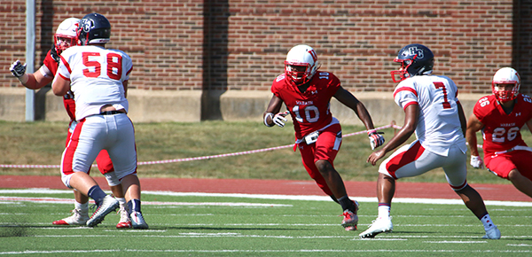 Byshup Rhodes '19 goes for the tackle.