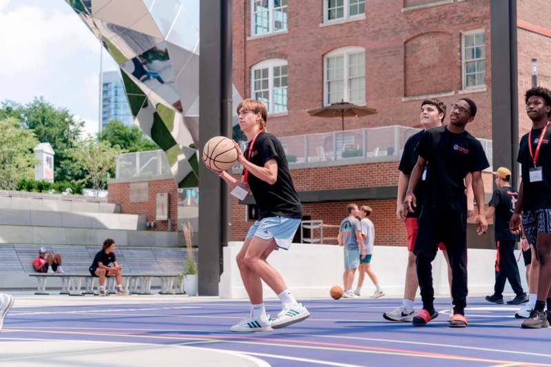 a group of people on a basketball court