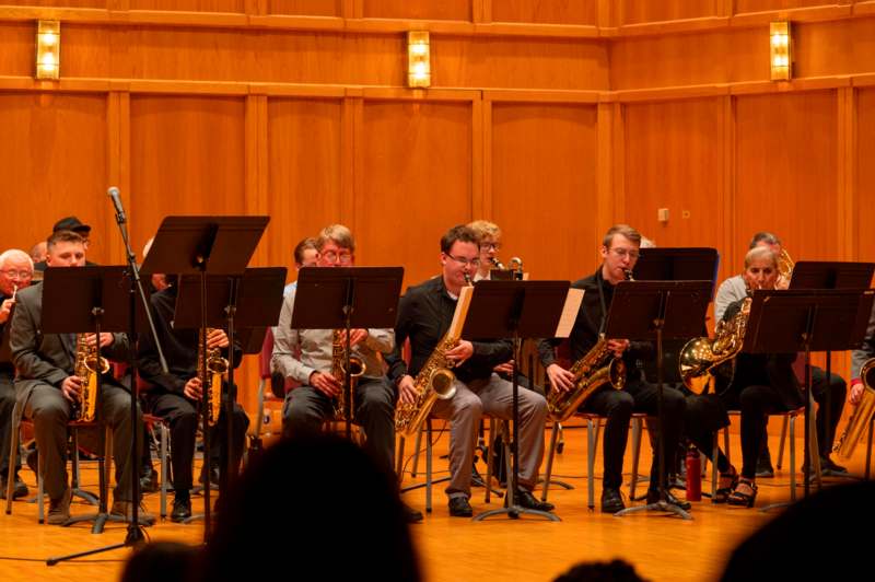 a group of people playing instruments