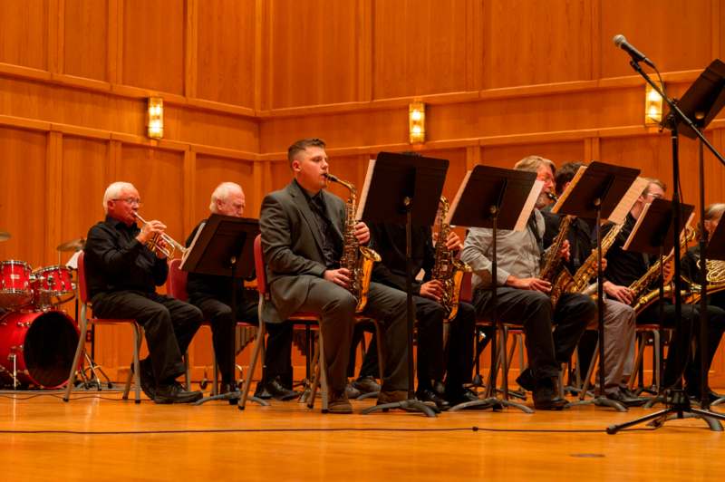 a group of people playing instruments