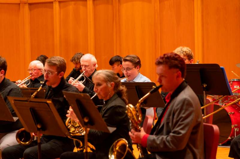 a group of people playing instruments