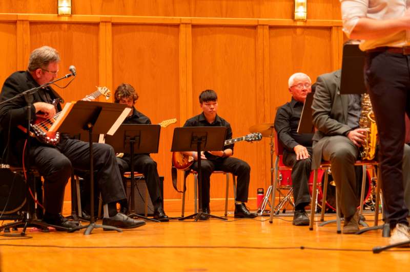 a group of people playing instruments