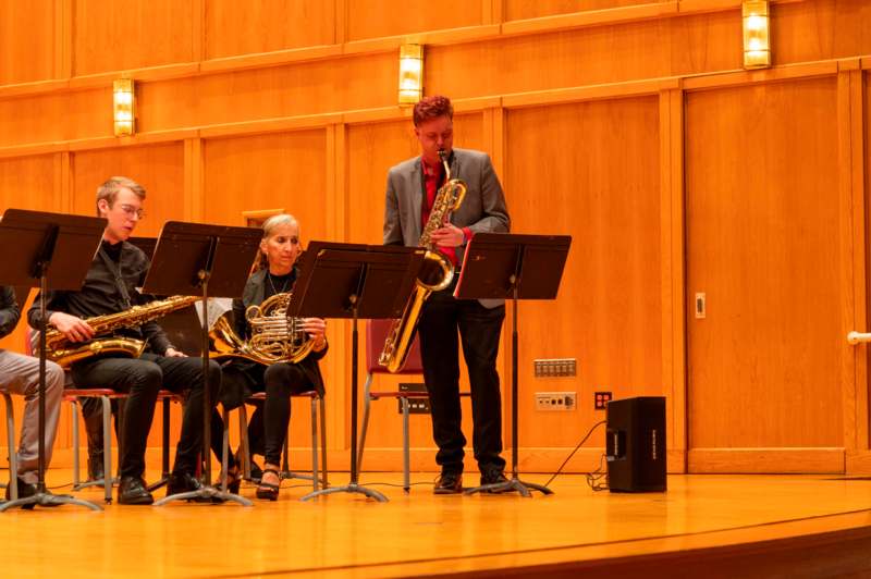 a group of people playing instruments