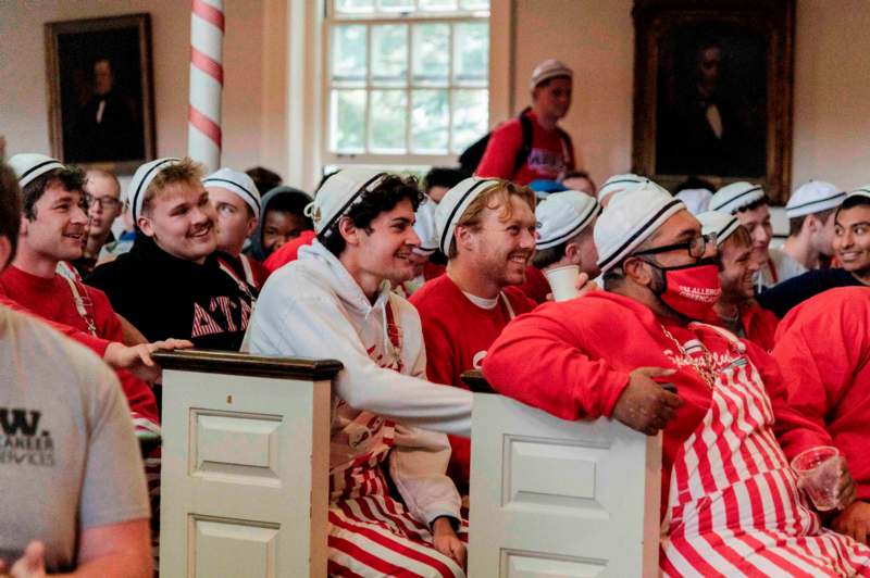 a group of people sitting in chairs