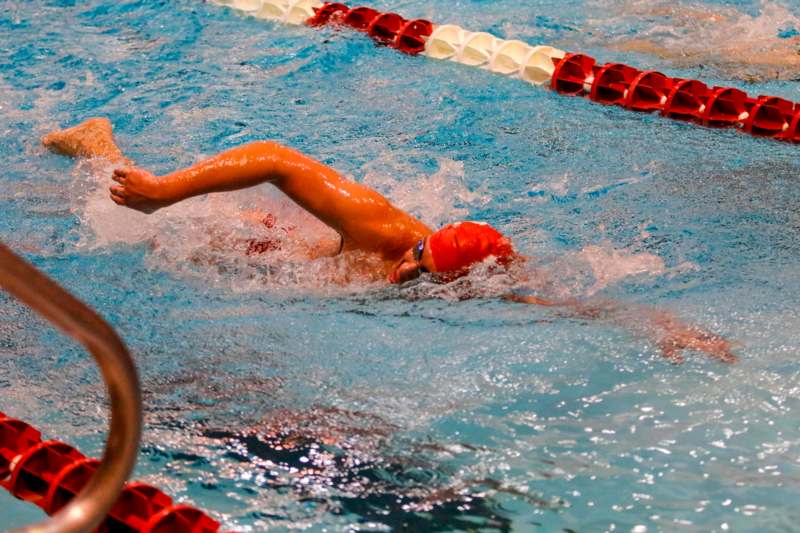 a person swimming in a pool