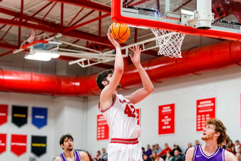 a basketball player dunking a basketball