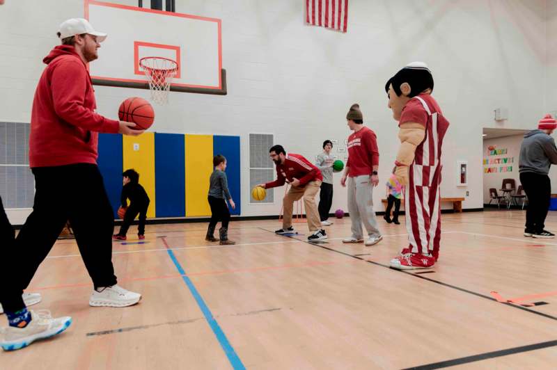 a group of people in a gym