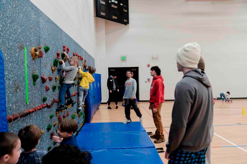 a group of people in a gym