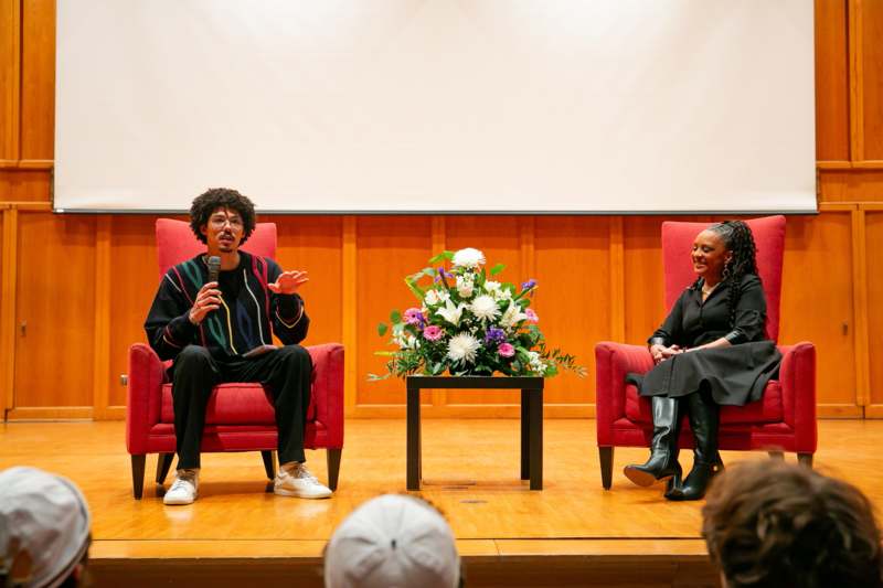 a man and woman sitting in chairs