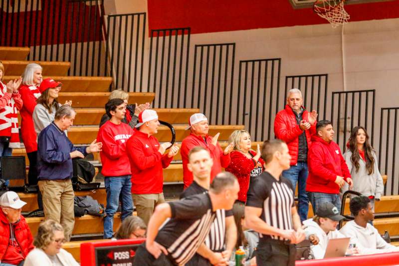 a group of people in a gym