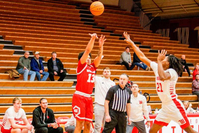 a group of people in a basketball game