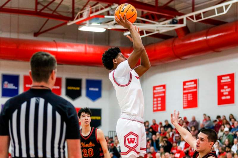 a basketball player in a gym