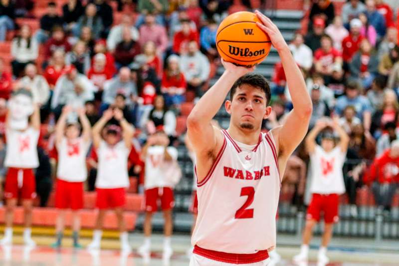 a man holding a basketball