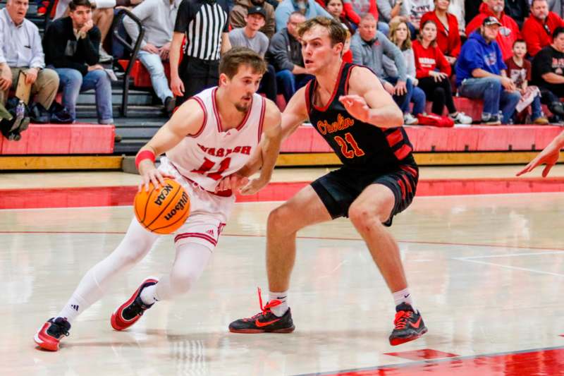 a basketball player chasing a basketball