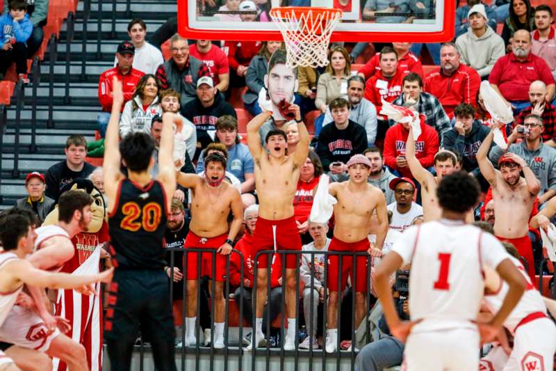 a group of people in a basketball game