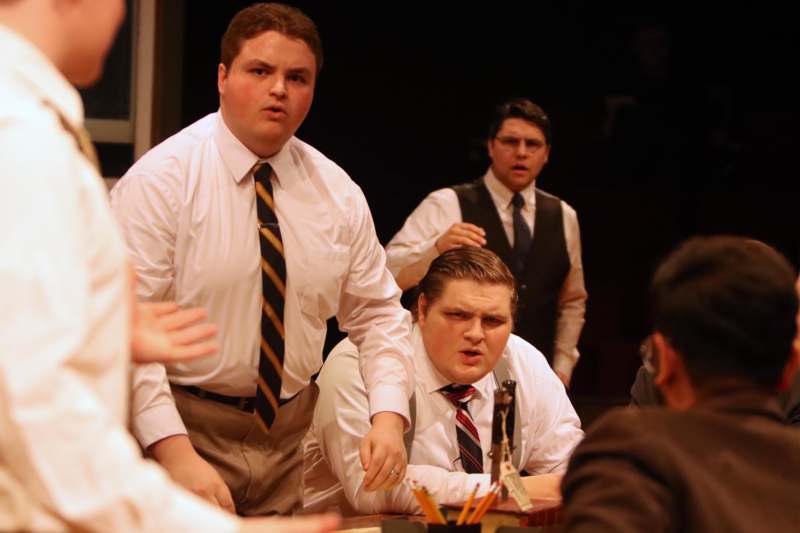 a group of men in white shirts and ties