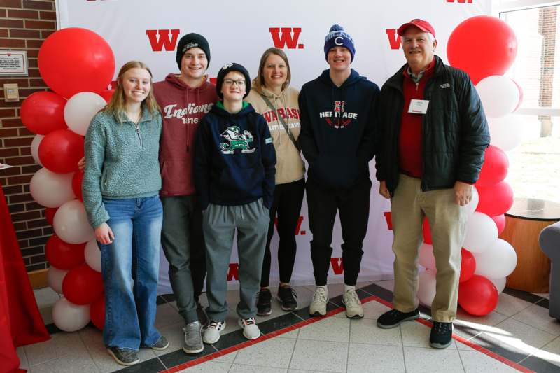 a group of people posing for a photo