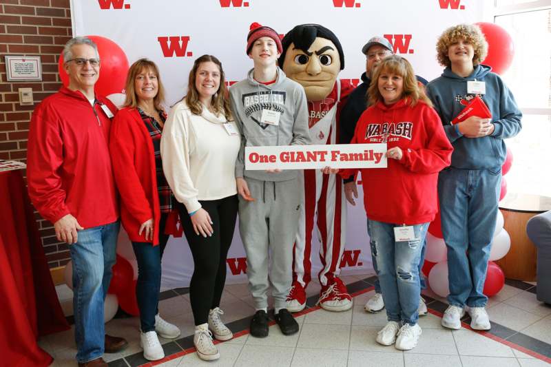 a group of people posing for a photo