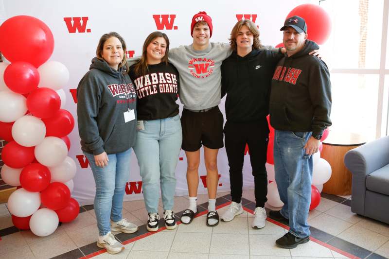 a group of people posing for a photo