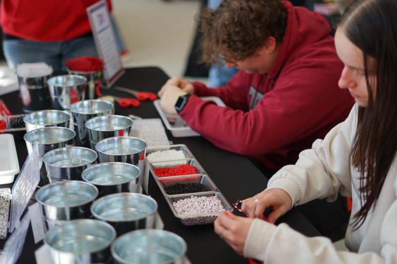 a group of people working on a table