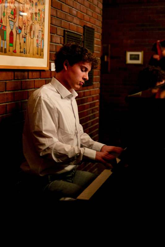 a man playing a piano